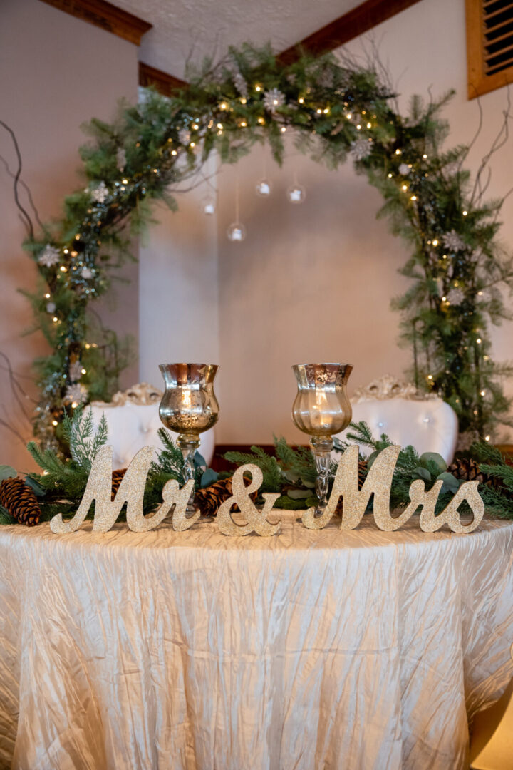 A table decorated with a “Mr. & Mrs.” signage